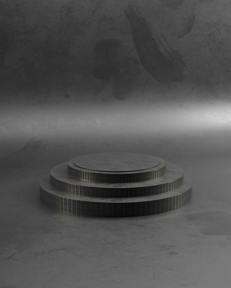 A minimalist circular podium with a metallic finish set against a dark, textured background.